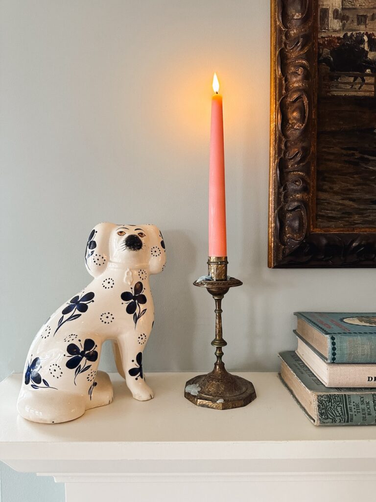 pink taper candle staffordshire dog fireplace mantel decor brass candlestick the inspired room