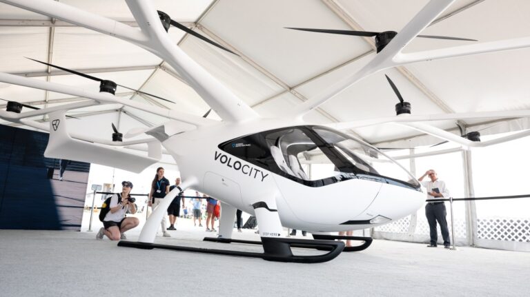 Volocopter at Oshkosh EAA21 Booth VoloCity Visitor Taking Pictures